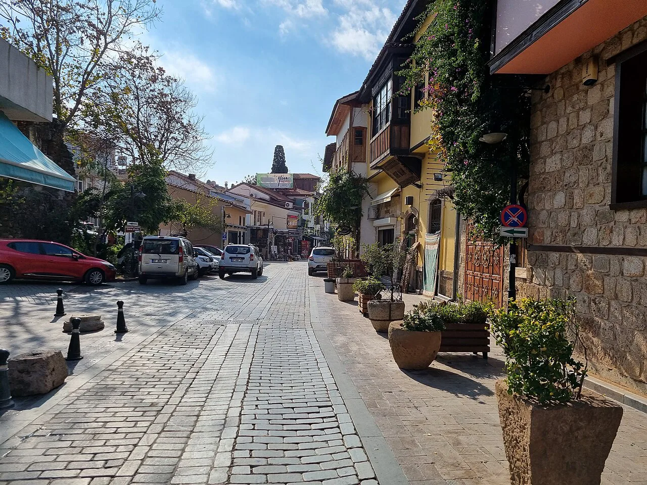 A cobbled street lined with old stone houses in Kaleiçi, Antalya.