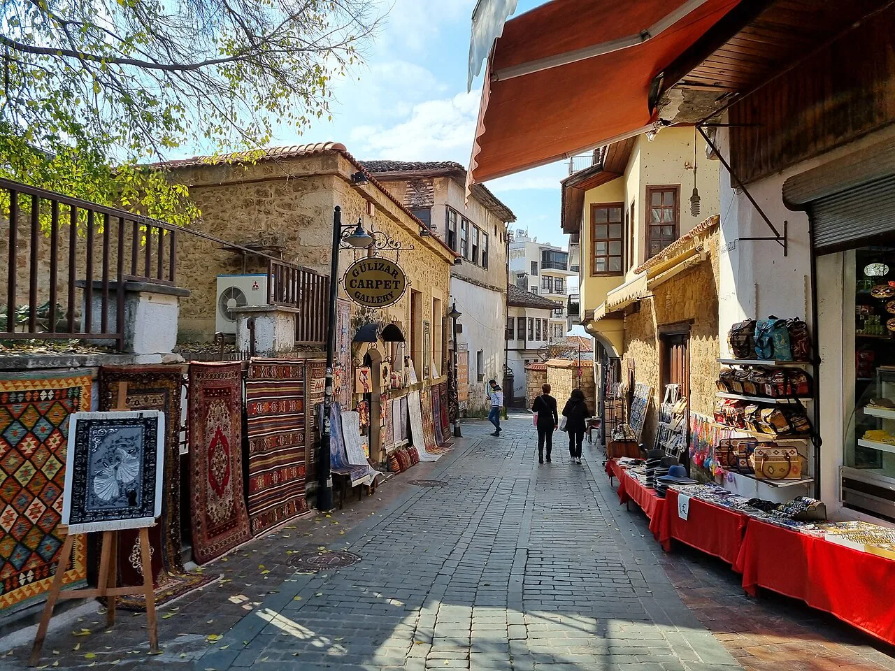 Carpet and souvenir shops on a street in Kaleiçi, Antalya's old town.