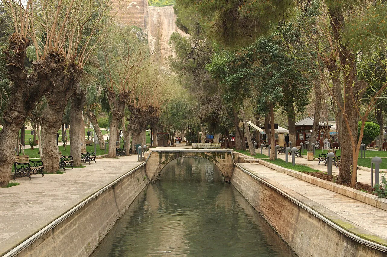 A tree-lined canal in the Balıklıgöl park, Şanlıurfa.