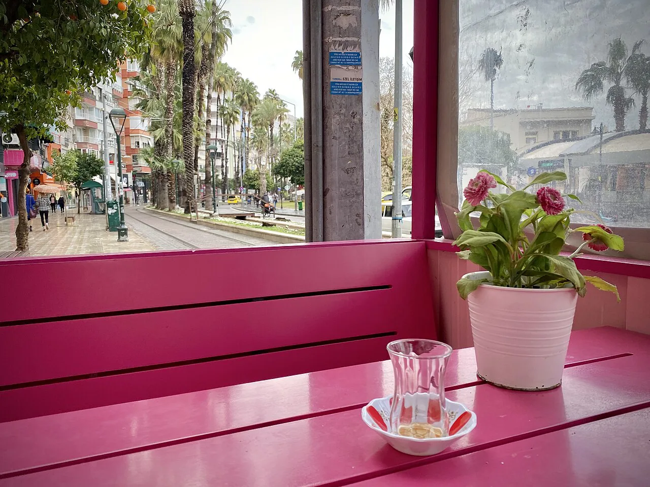 A glass of Turkish tea on a café table in Antalya.