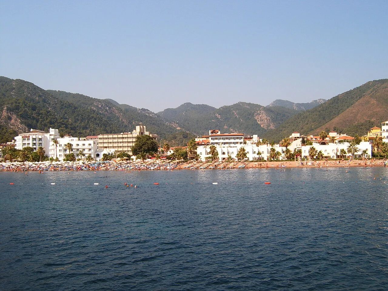 İçmeler's seafront hotels below the mountains.