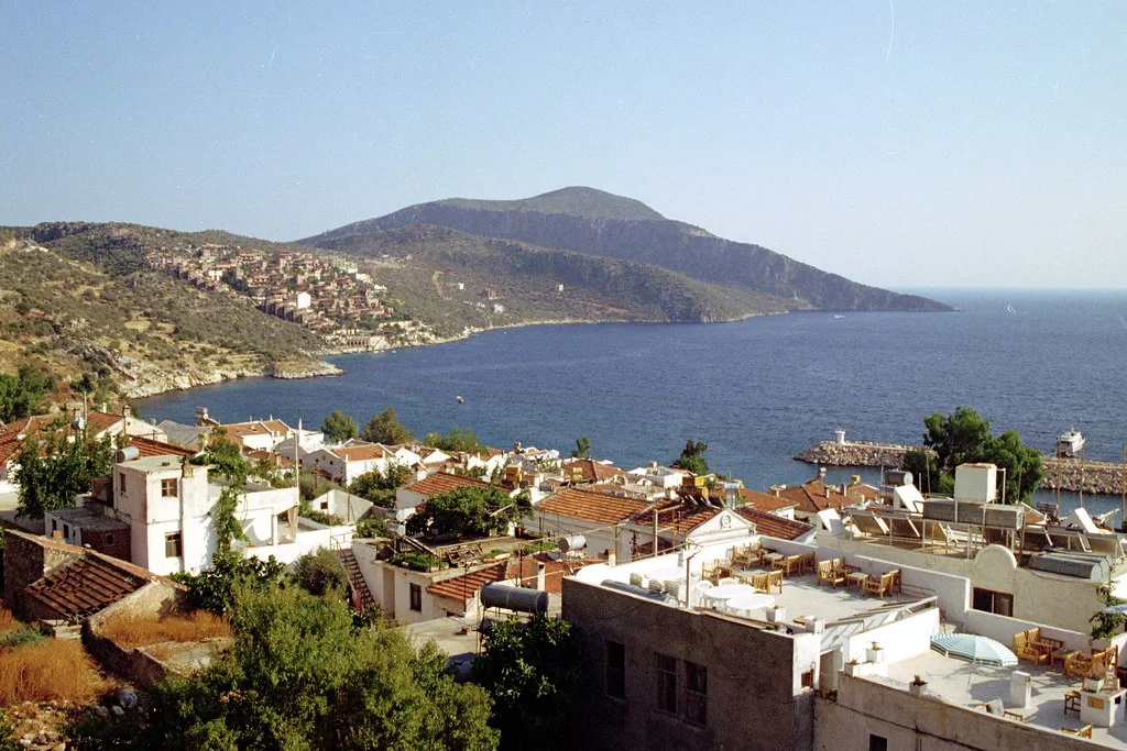 Kalkan's rooftops and bay, with the hills of the Lycian coast beyond.