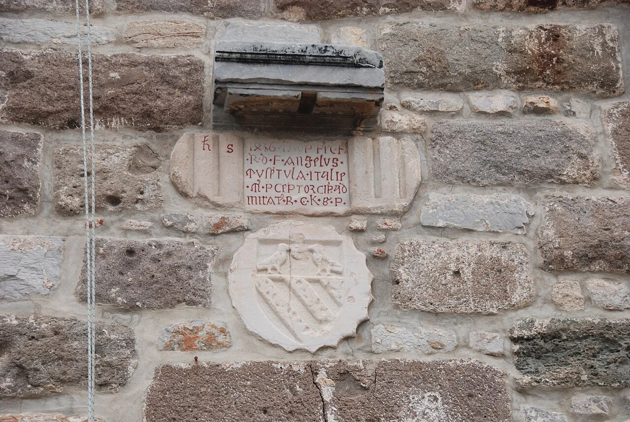 Coats of arms set into a tower wall at Bodrum Castle.