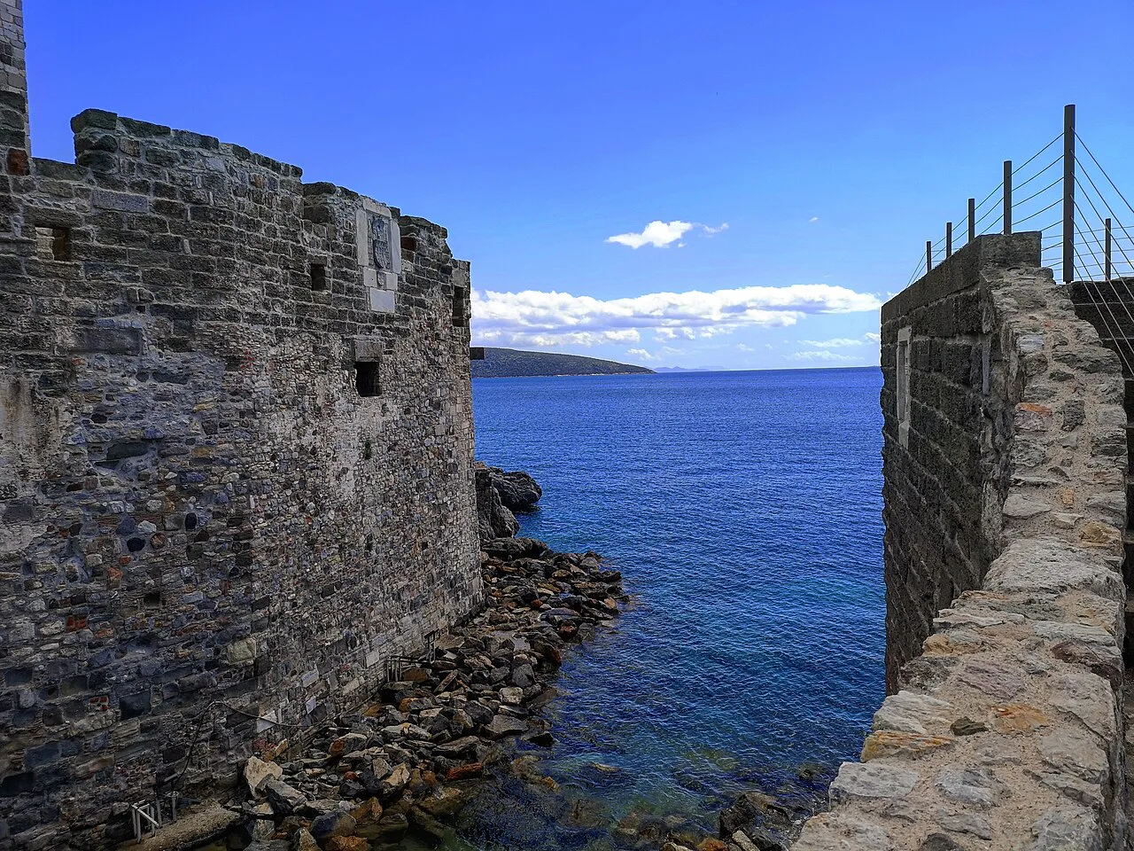 A tower of Bodrum Castle above the sea.
