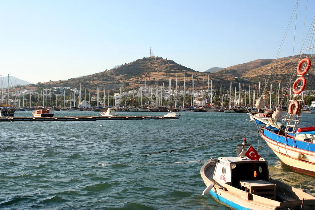 Gulets and small boats moored in Bodrum harbour.