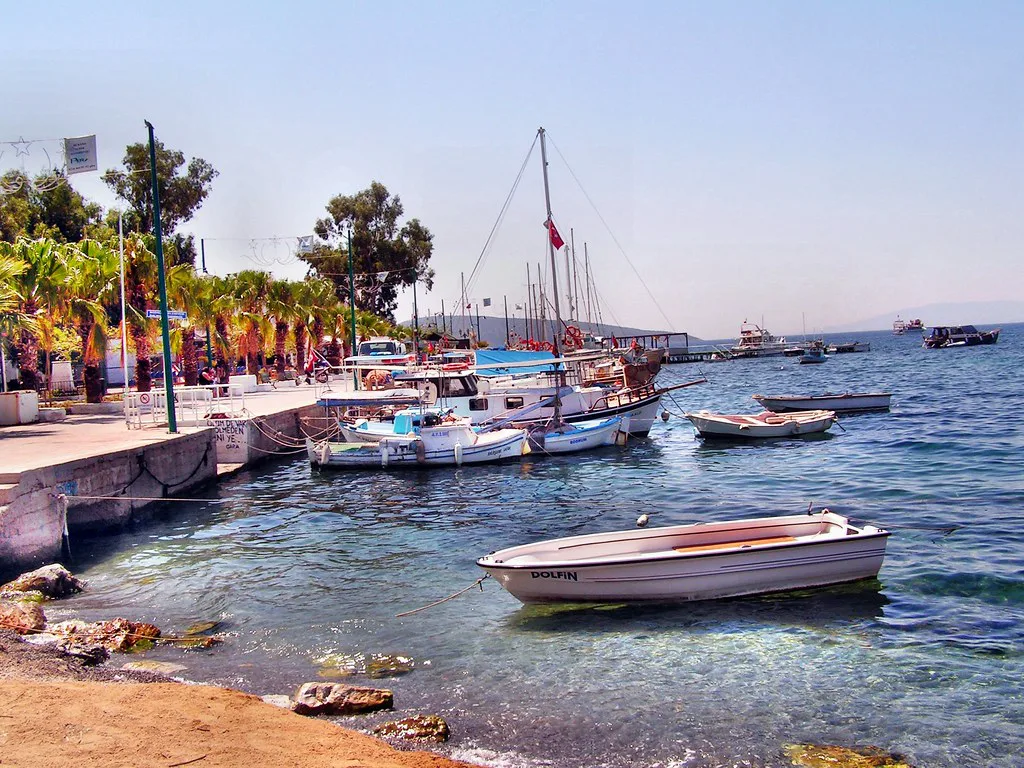 Small boats moored along the Bodrum waterfront.