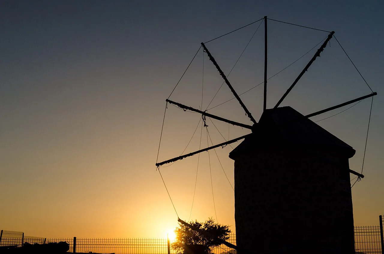 A Bodrum windmill silhouetted at sunset.