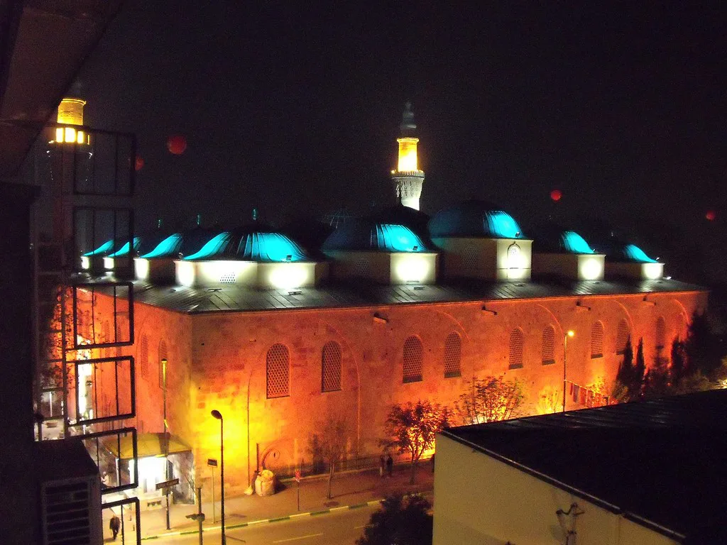 The Grand Mosque (Ulu Cami) in Bursa lit up at night.