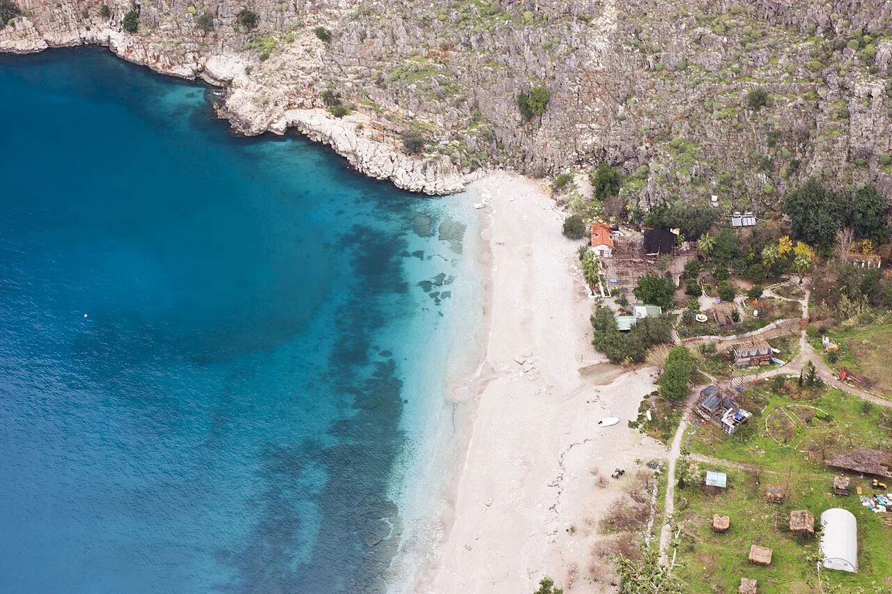 Butterfly Valley's beach and turquoise cove near Ölüdeniz, seen from above.