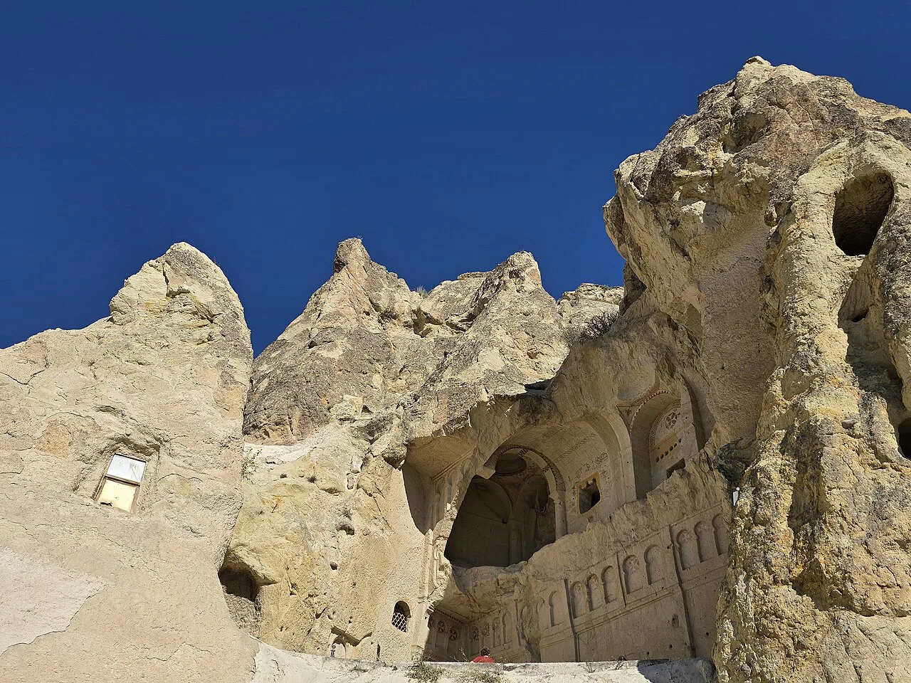 The rock-cut exterior of the Dark Church at the Göreme Open-Air Museum.