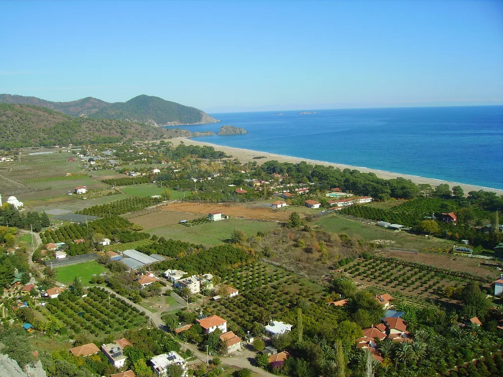 Çıralı's orchards and beach along the coast from above.