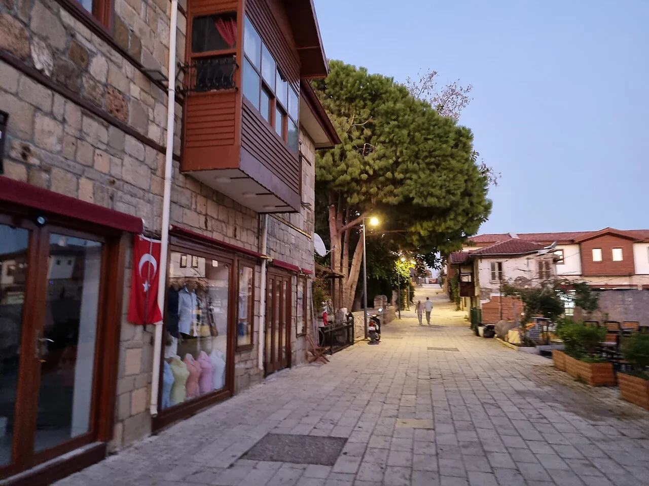A paved street of shops and houses in Side.