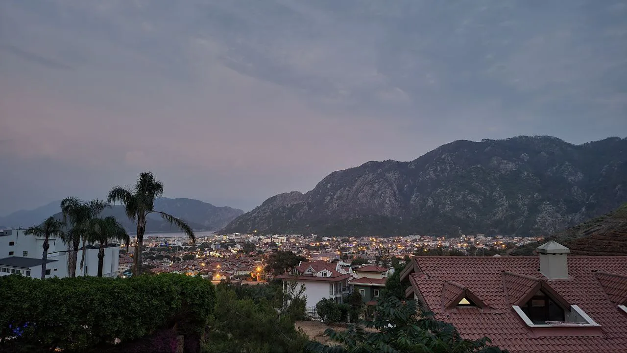 Evening view over İçmeler towards the mountains.