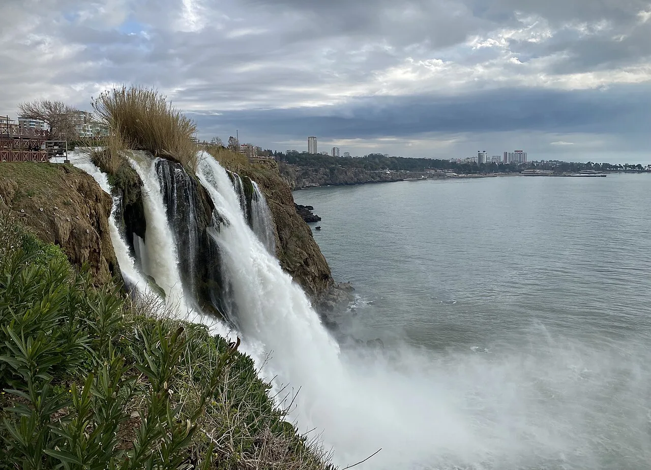 The Lower Düden Waterfall pouring off the cliffs into the Mediterranean.
