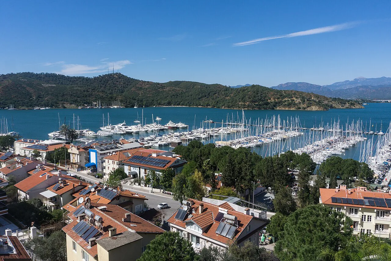 Fethiye's marina and rooftops seen from the hillside.