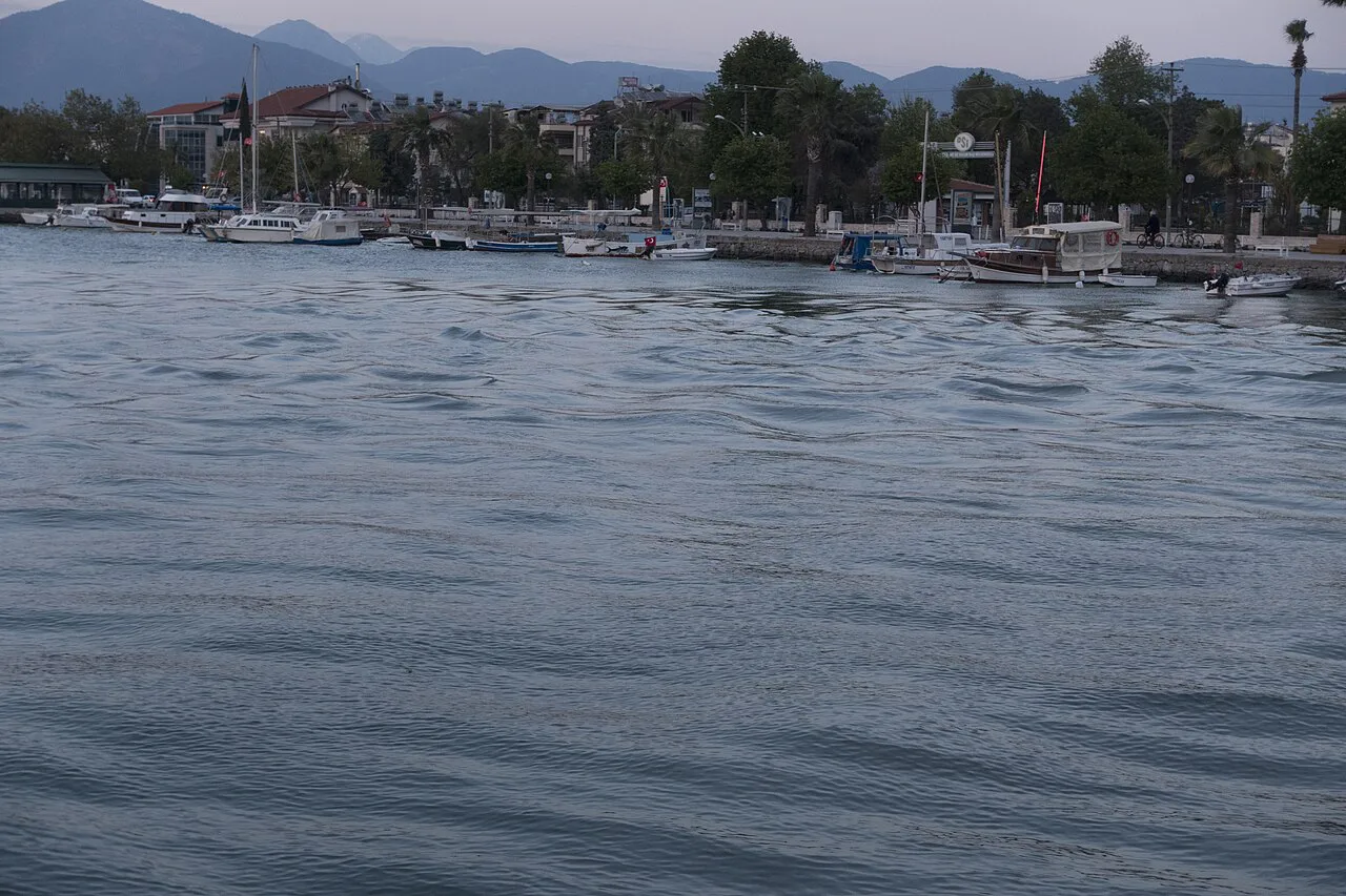 Moored boats across the water in Fethiye harbour.