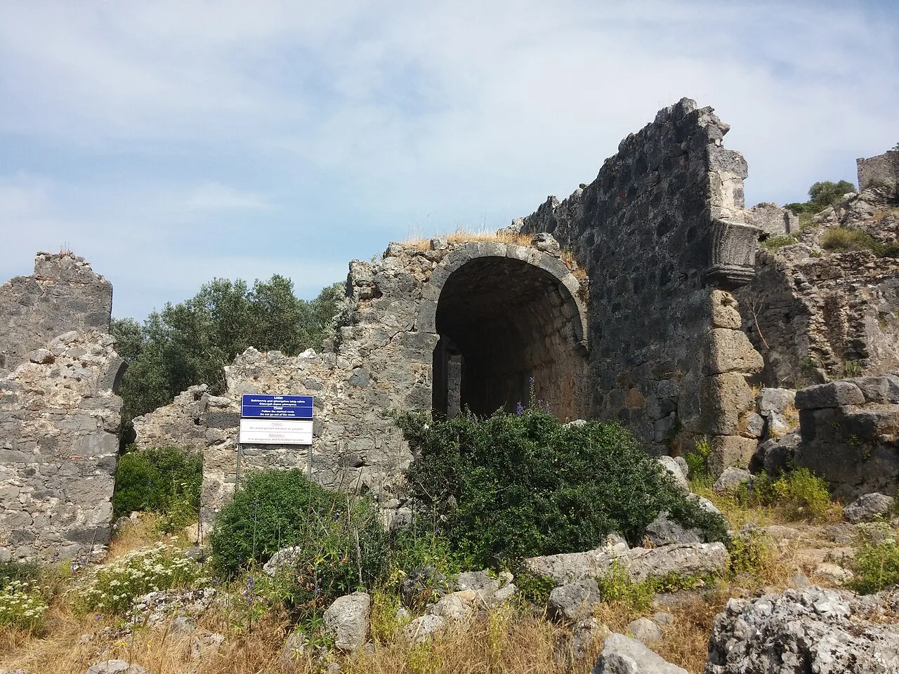 A ruined arch along the path on Gemiler Island.