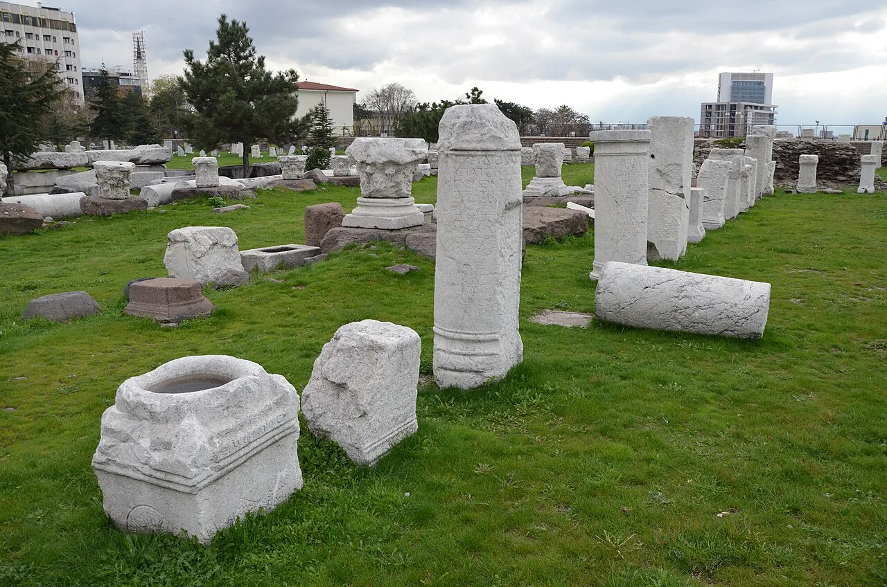 Stone fragments on the lawn at Ankara's Roman Baths open-air museum.