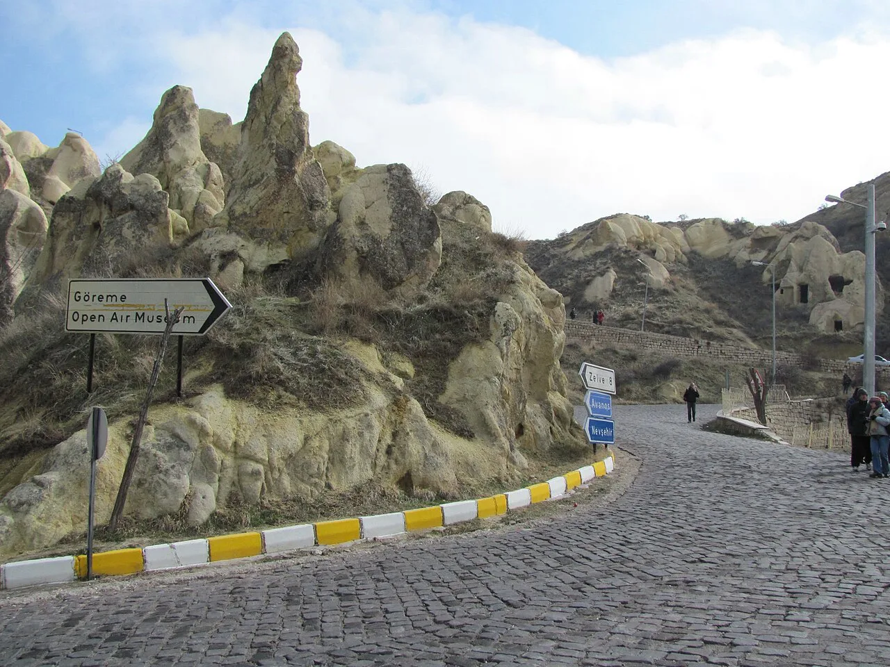 The approach road to Göreme Open-Air Museum among the rock formations.