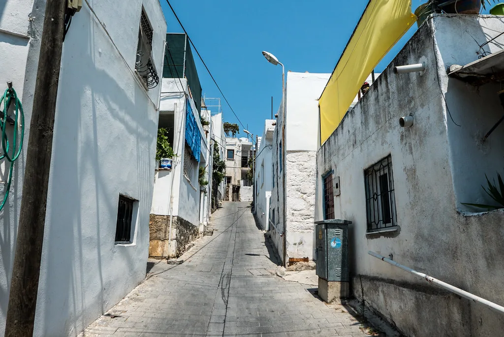 A narrow street of whitewashed houses in Bodrum.