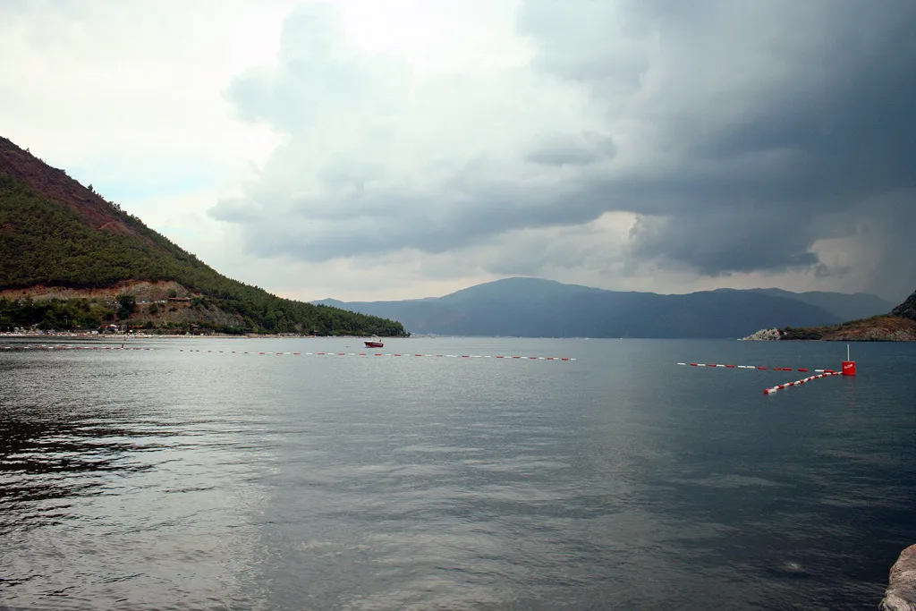 İçmeler bay under a cloudy sky.