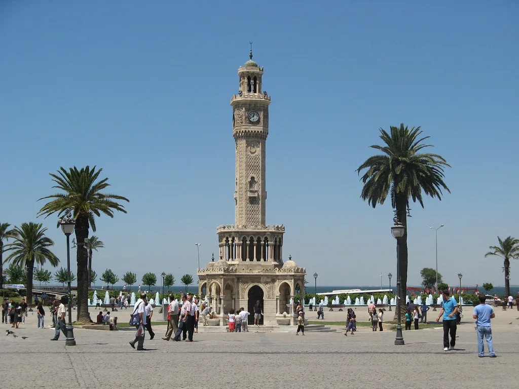 The clock tower and palm trees in Konak Square, İzmir.