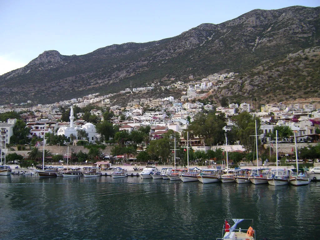 Yachts in Kalkan harbour below the town and mountains.