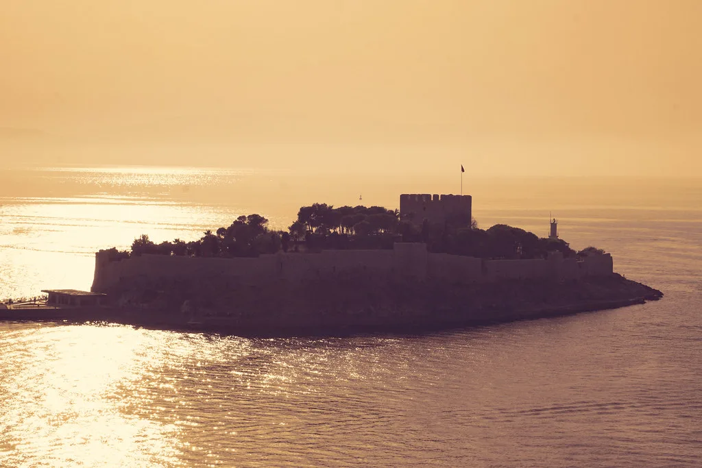Pigeon Island and its castle off Kuşadası at sunset.