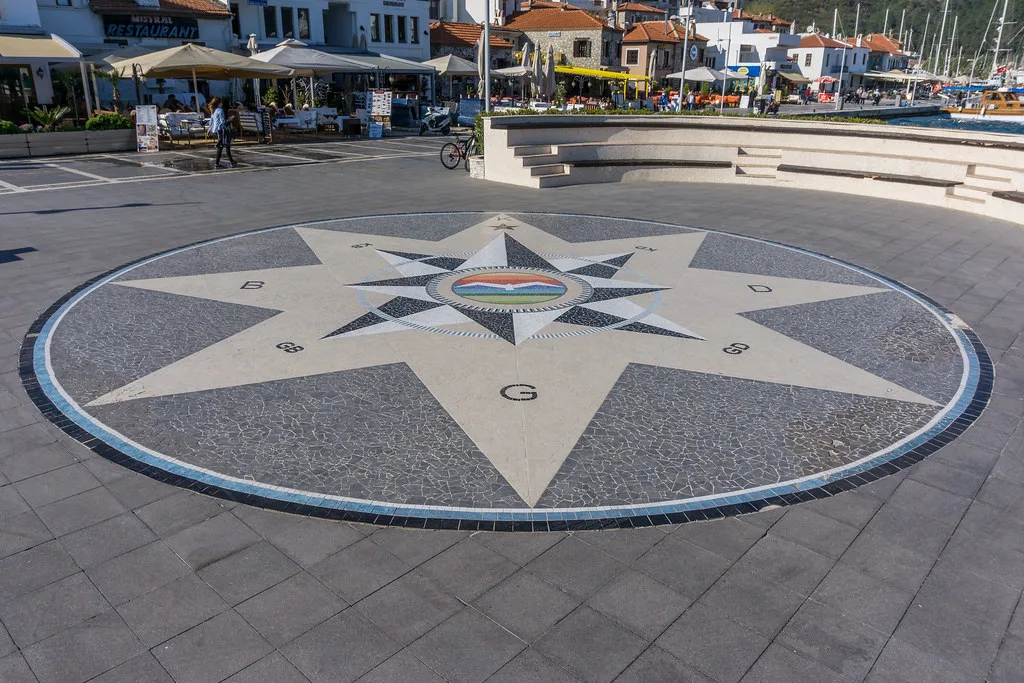 A compass-rose mosaic on the waterfront promenade in Marmaris.