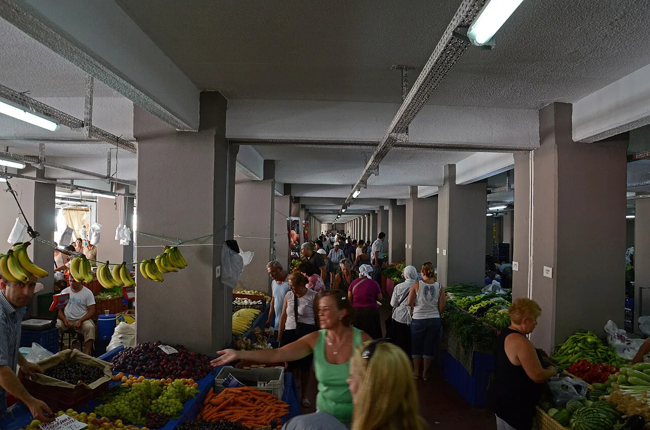 Fruit and vegetable stalls inside a covered market in Marmaris.