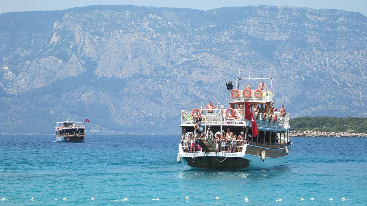 Excursion boats on clear turquoise water near Marmaris.