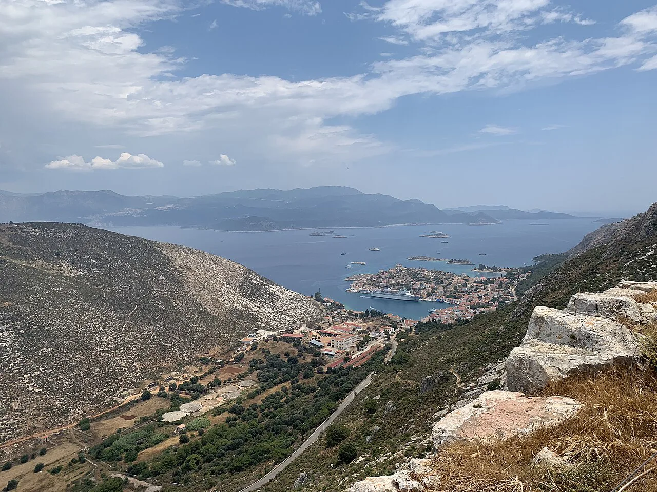 The hills of Kastellorizo above the harbour town, with the Turkish coast beyond.