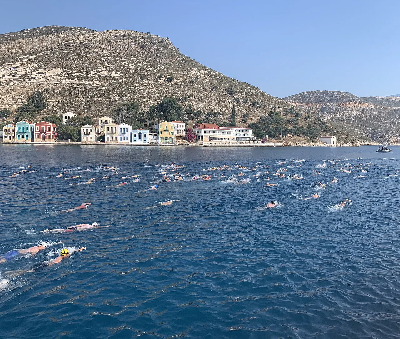 Kastellorizo's waterfront houses seen across the sea.