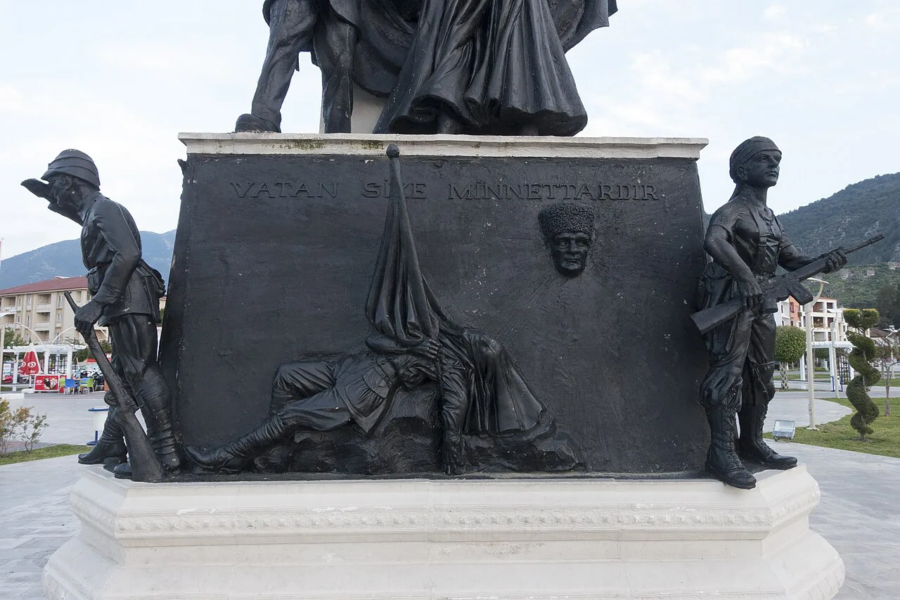 Bronze figures and a relief of Atatürk on the Martyrs' Monument near Fethiye marina.