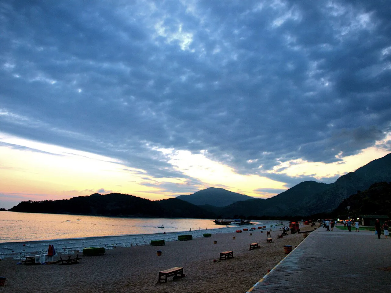 The beachfront promenade at Ölüdeniz at dusk.