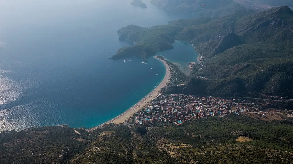 Ölüdeniz beach and lagoon seen from the mountains above.