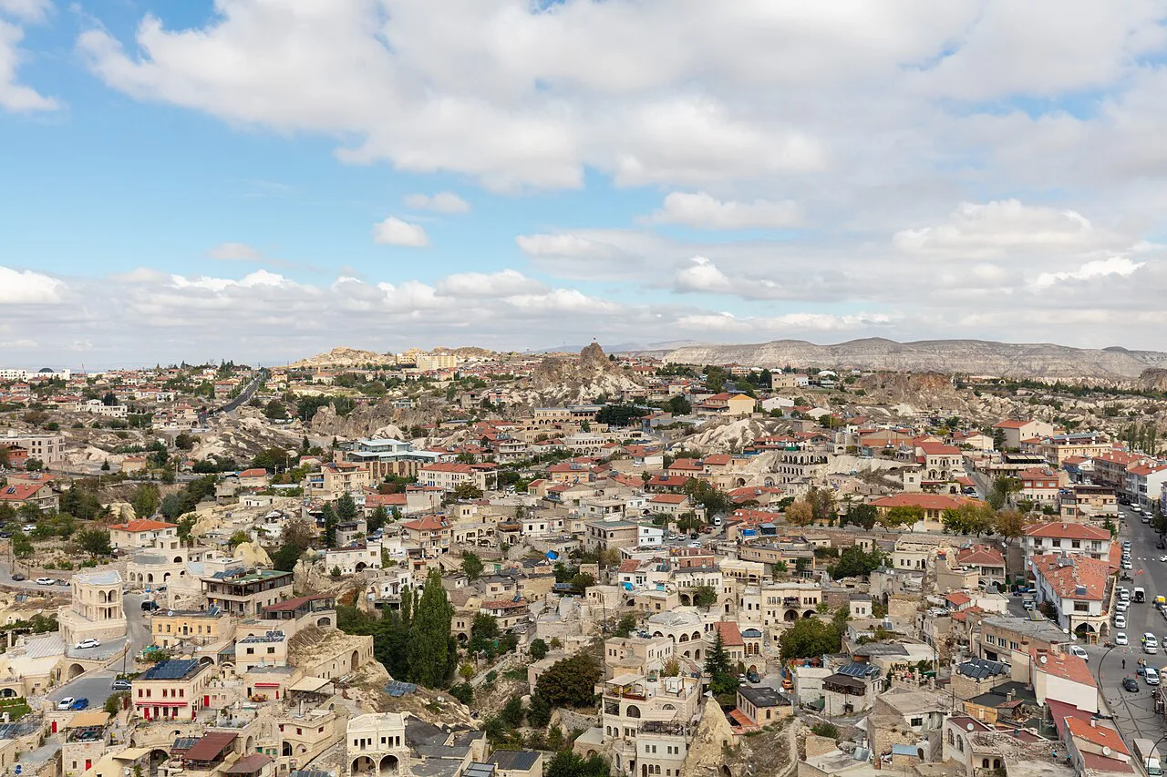 Rooftops of Ortahisar spreading across the Cappadocian plateau.