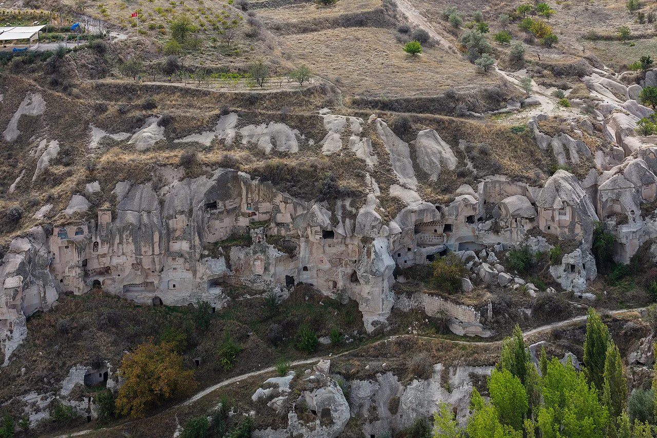 Rock-cut dwellings in the valley at Ortahisar, Cappadocia.