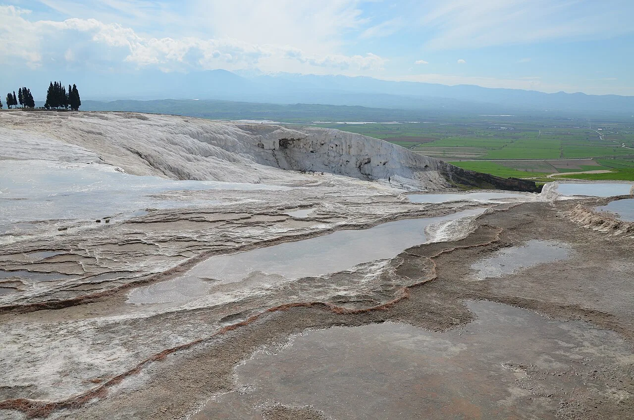 White travertine terraces at Pamukkale overlooking the plain.