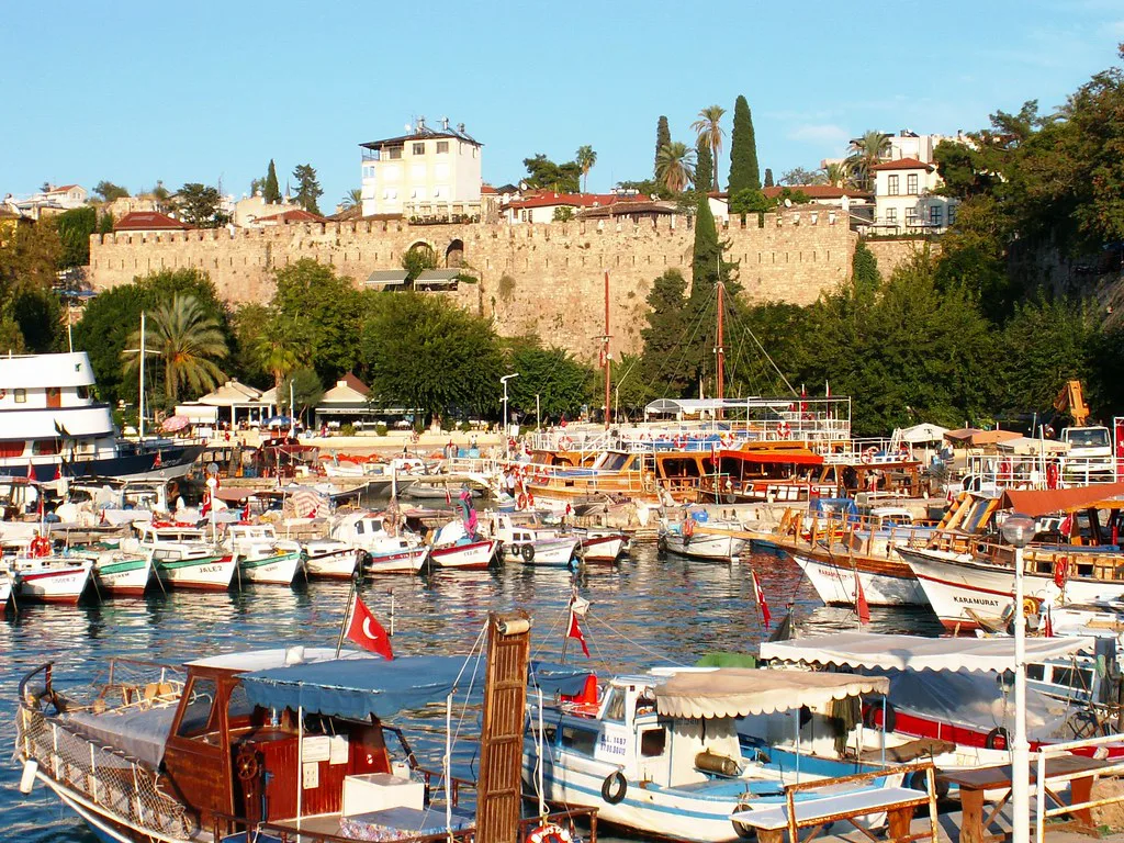 Excursion boats in Antalya's old harbour beneath the walls of Kaleiçi.