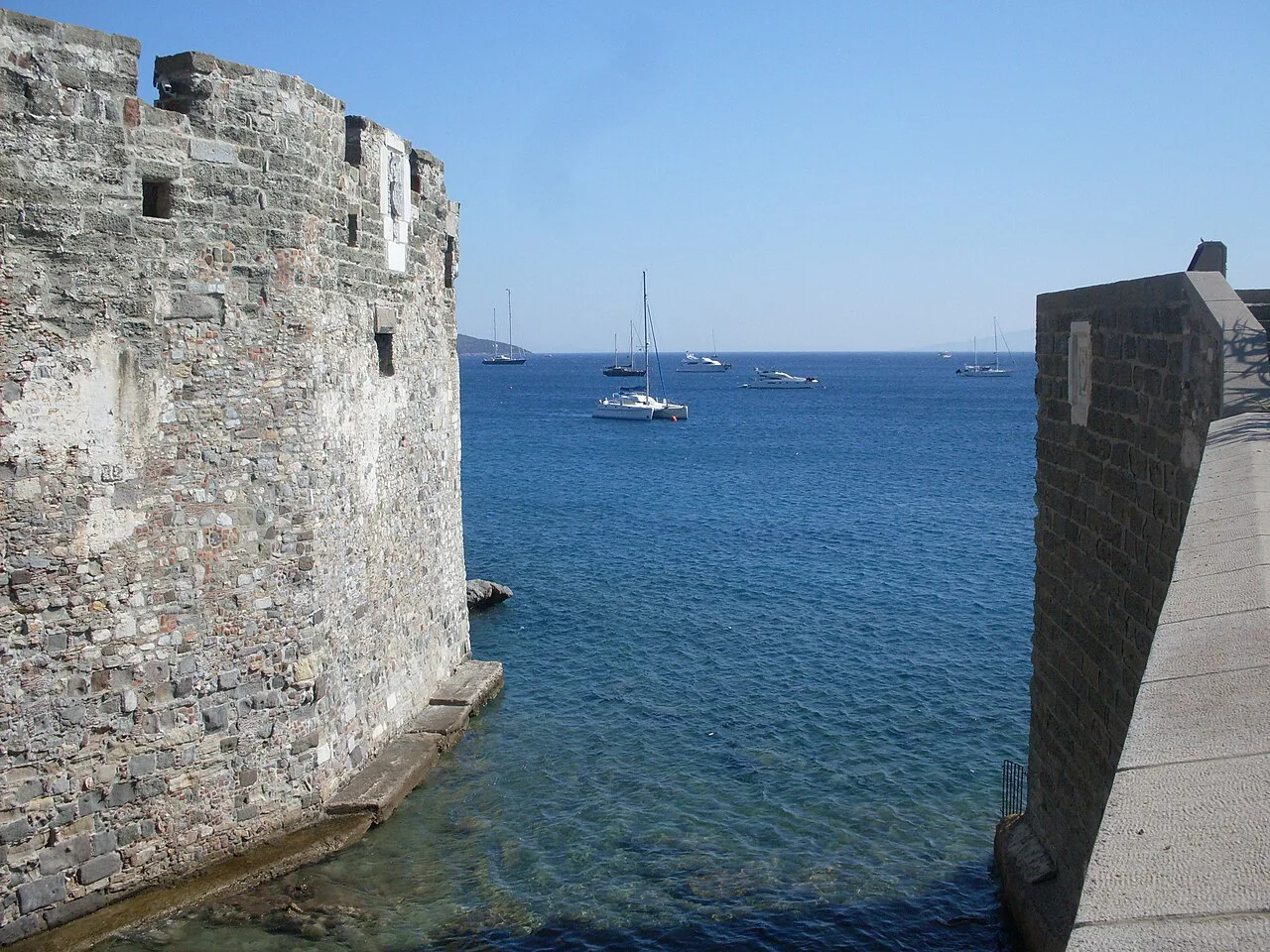 The sea seen between the walls of Bodrum Castle.