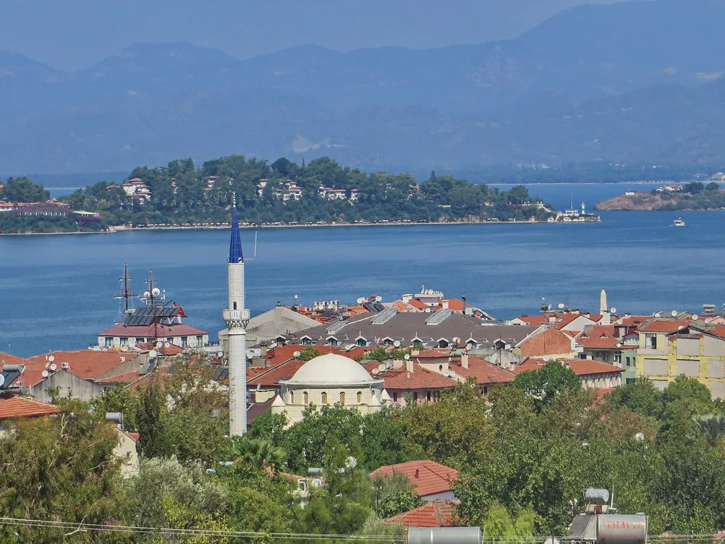 Fethiye town with a mosque minaret and the bay beyond.