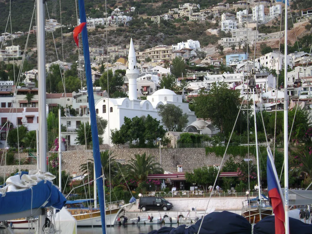 Kalkan's mosque and whitewashed houses seen from the harbour.