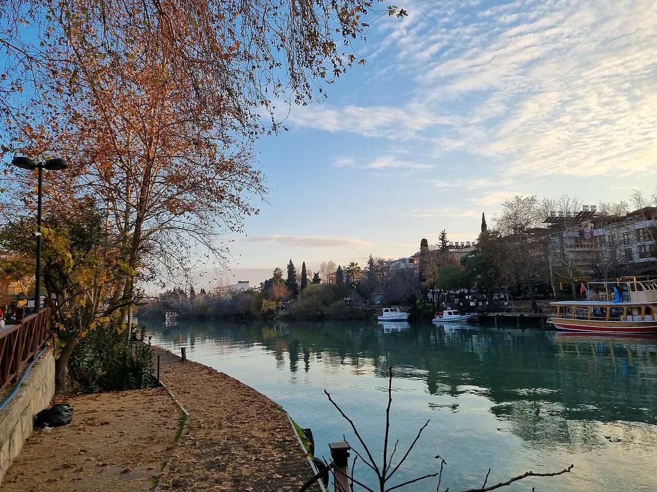 The Manavgat River and boats in the town centre.