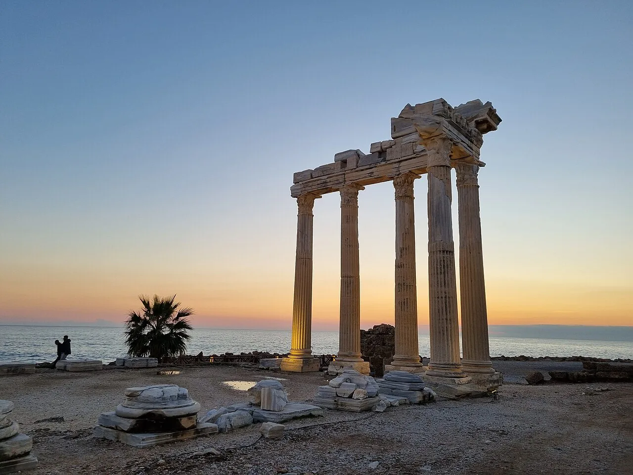 The Temple of Apollo at Side silhouetted at sunset.
