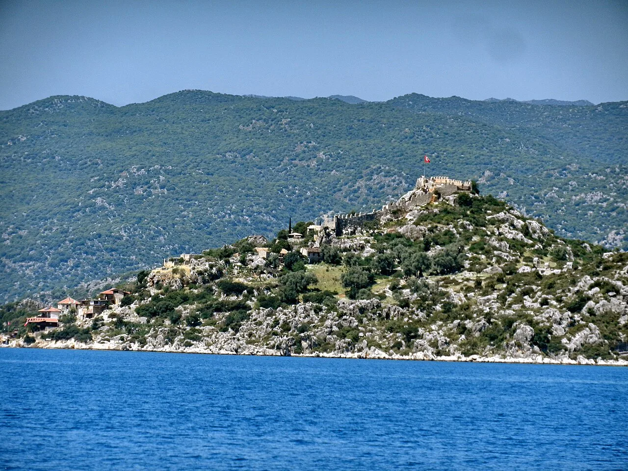 The hill of Simena with its castle, seen from the sea.