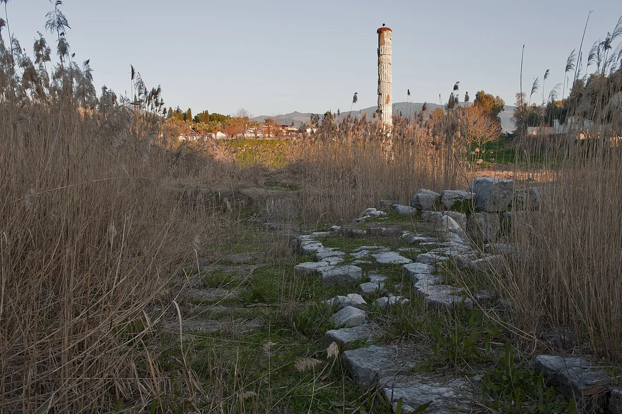 Marble fragments and the reconstructed column at the Temple of Artemis site in Selçuk.
