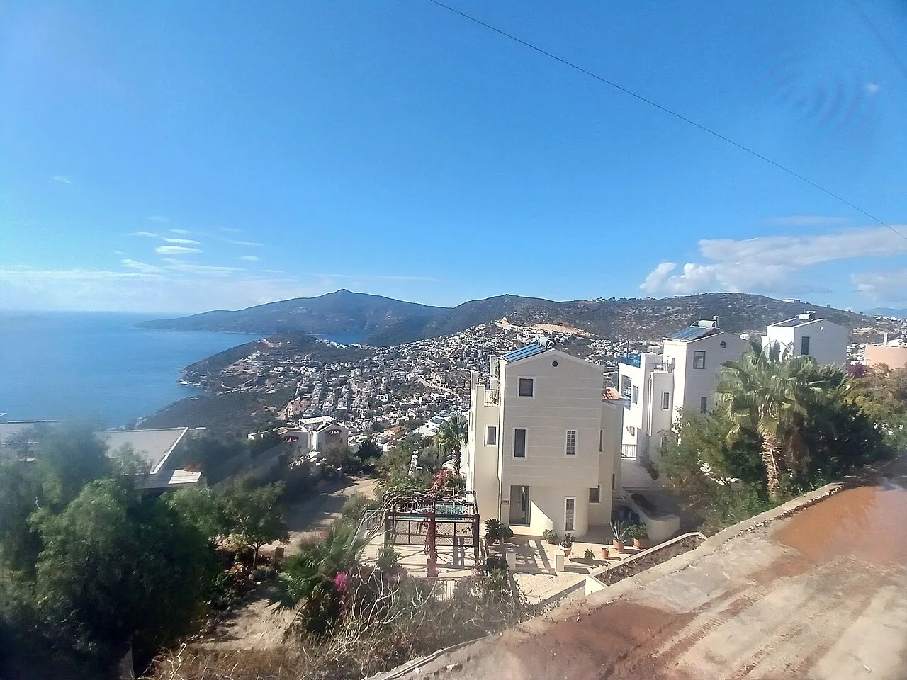 Kalkan's white villas on the hillside above the sea.