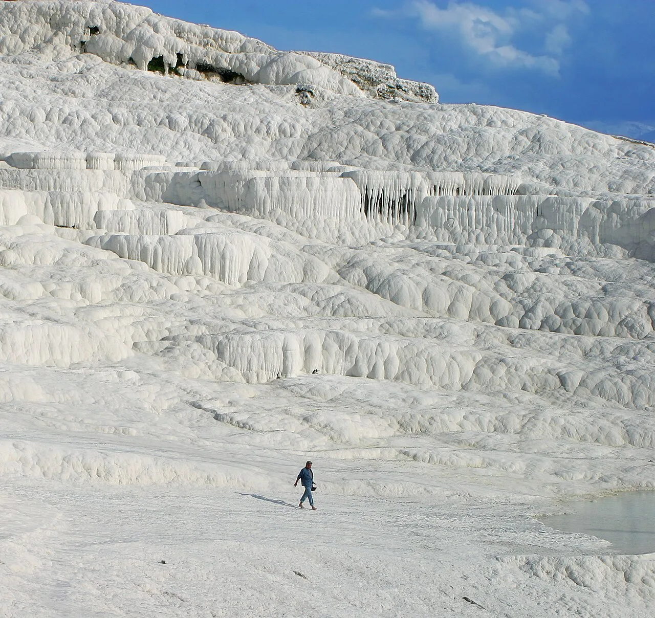 Limestone walls and hot springs at Pamukkale.
