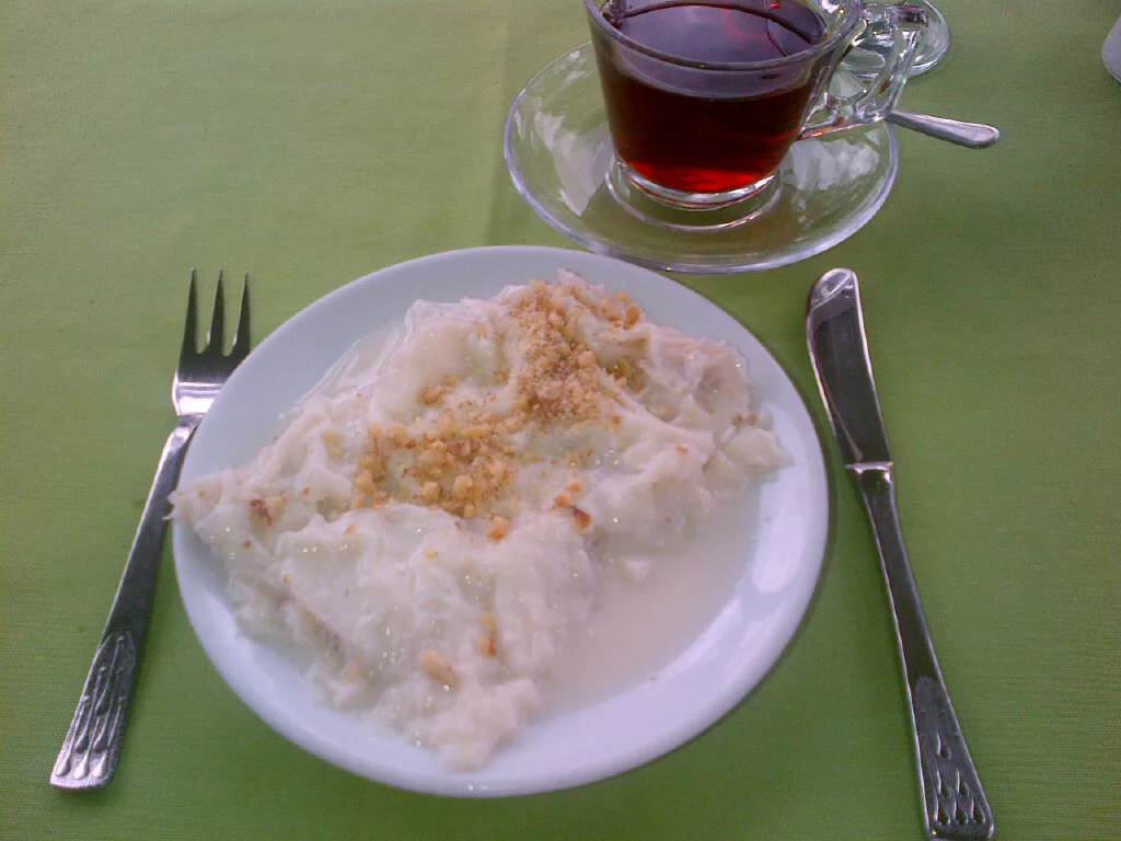 Güllaç, a light Ramadan dessert, served with Turkish tea.